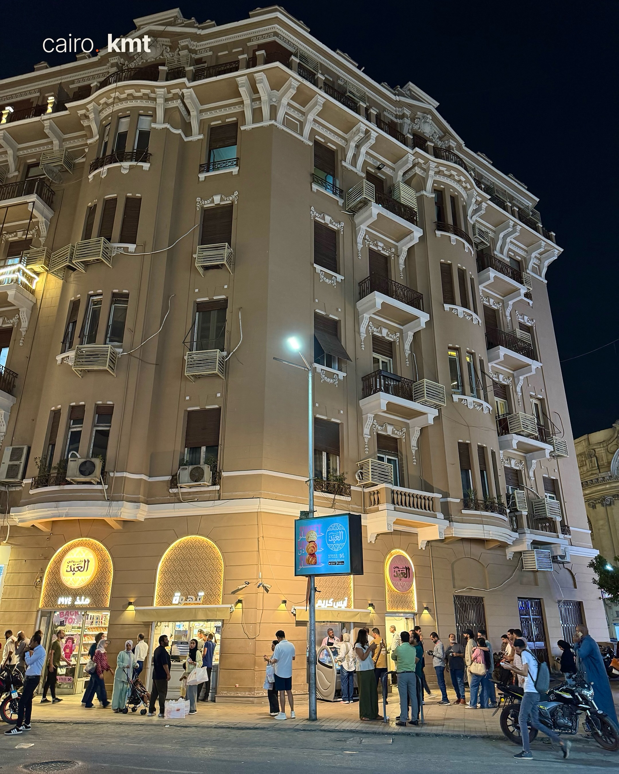 A lit Khedival-era building in Downtown Cairo at night