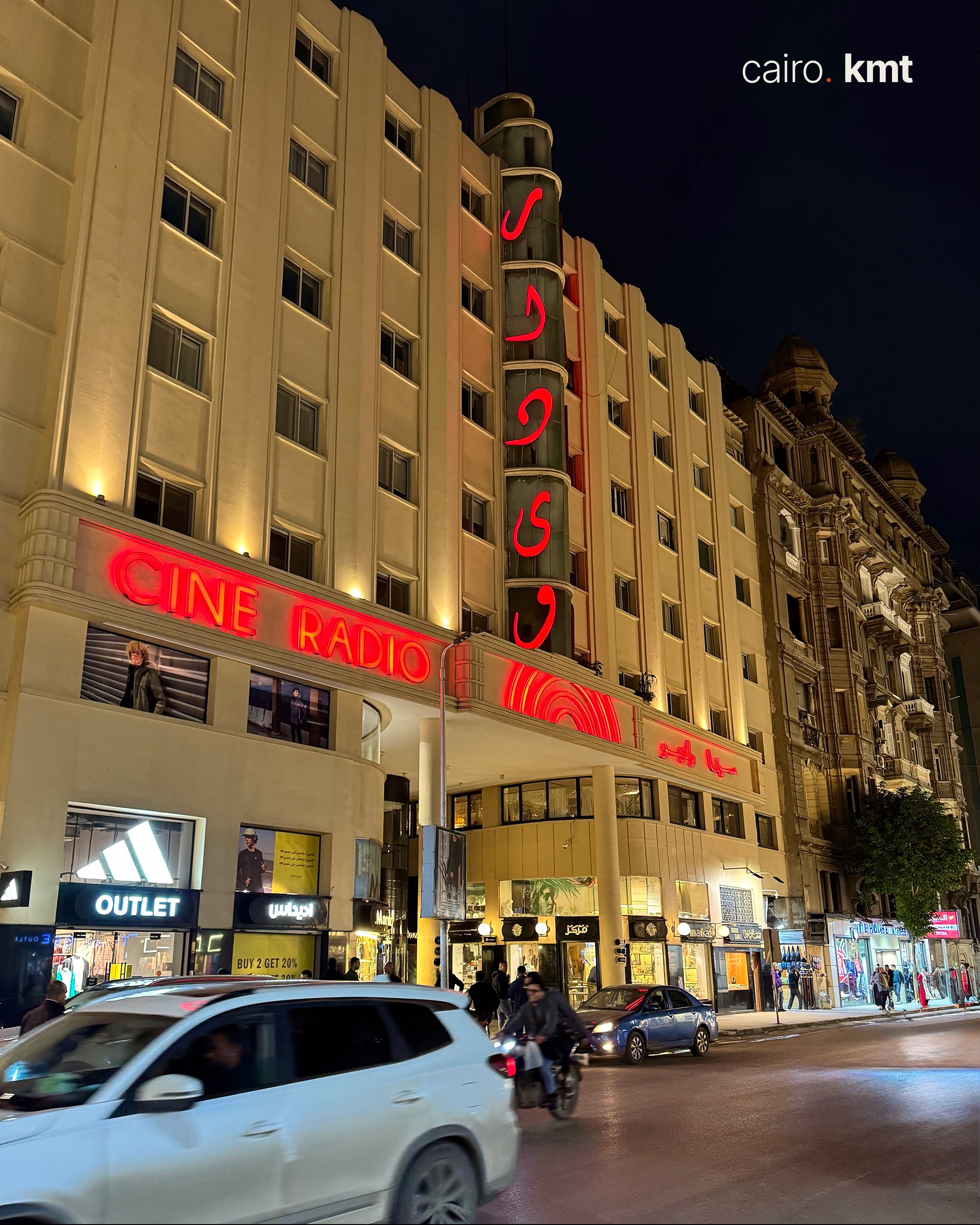 A lit Khedival-era building in Downtown Cairo at night