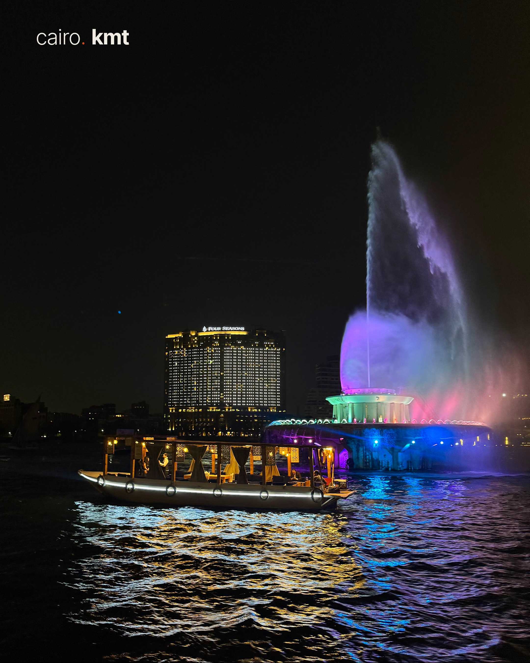 A lit Khedival-era building in Downtown Cairo at night