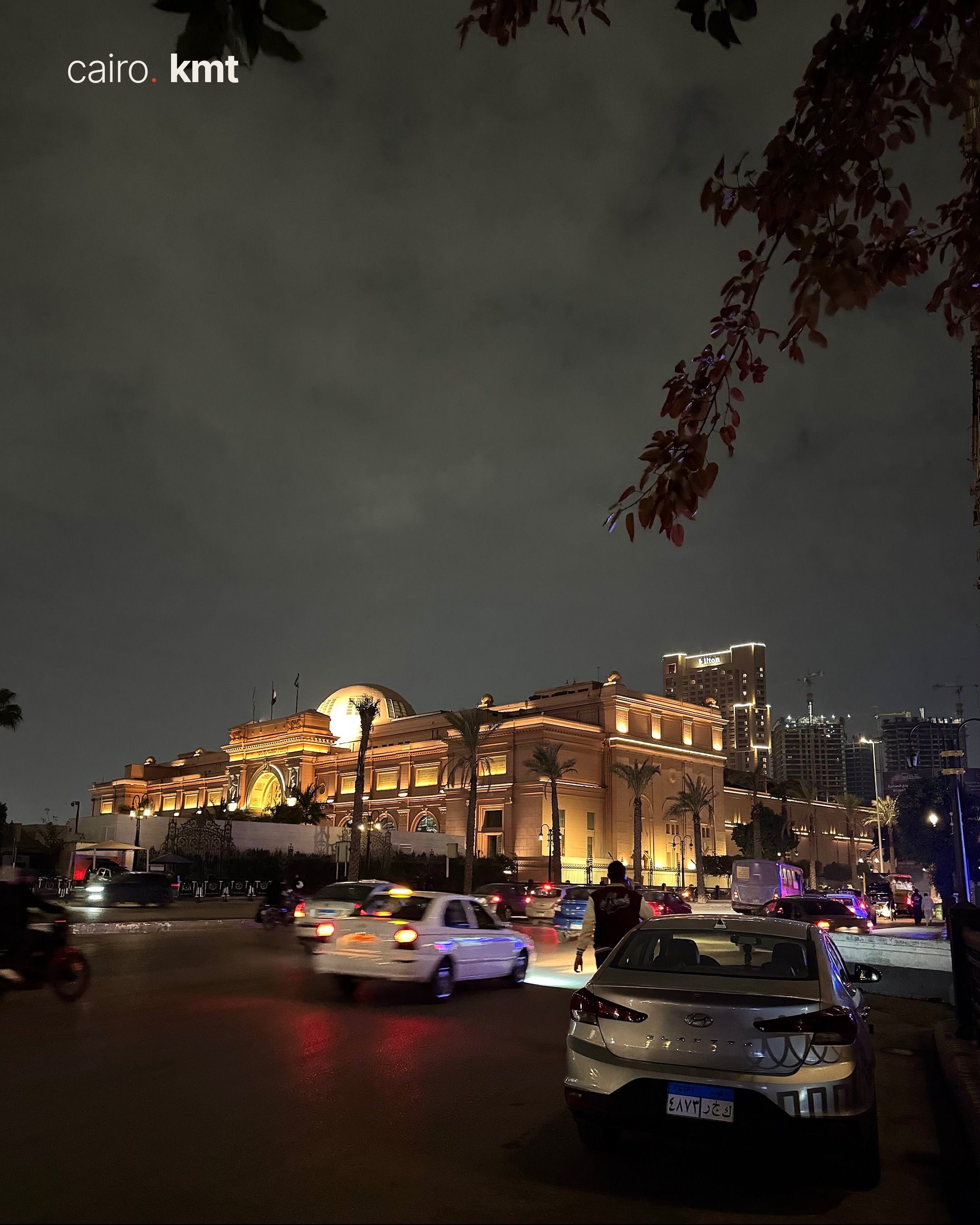 A lit Khedival-era building in Downtown Cairo at night