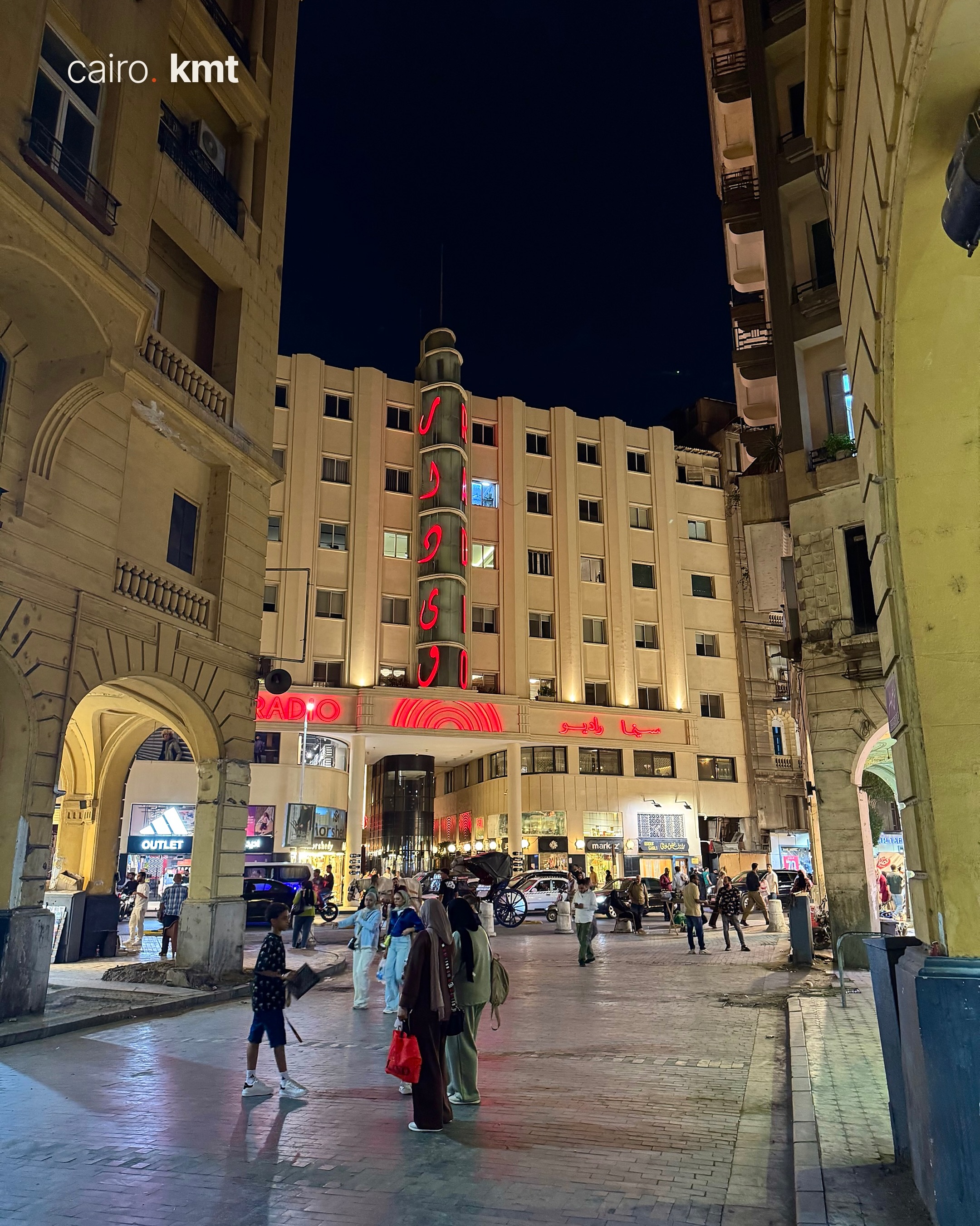 A lit Khedival-era building in Downtown Cairo at night