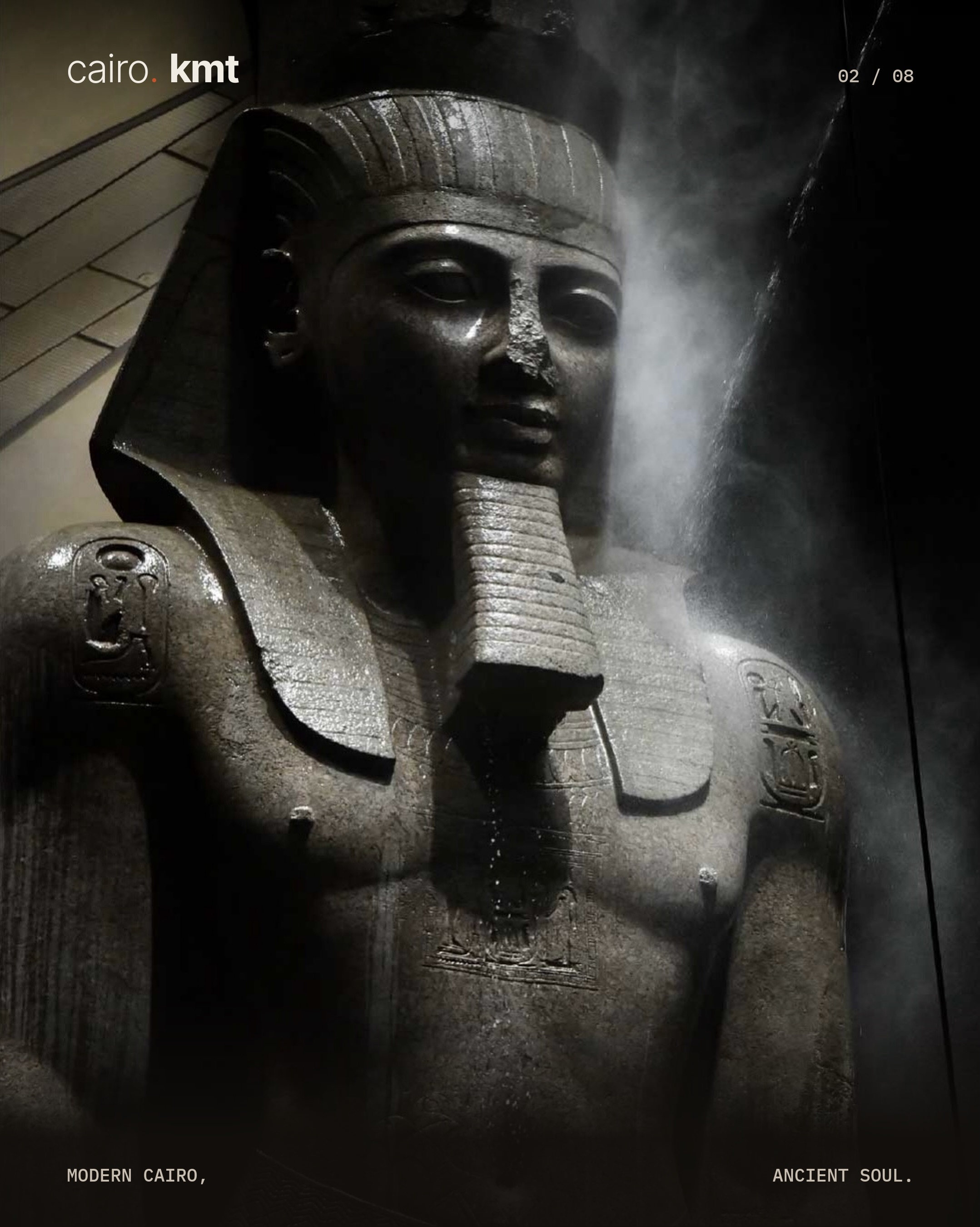 A conservator cleans the colossal statue of Ramesses II
